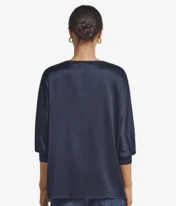 Blusa con scollo a V in seta
