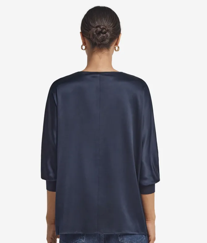 Blusa con scollo a V in seta