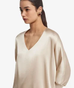 Blusa con scollo a V in seta