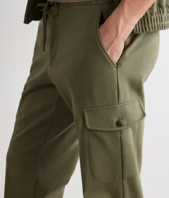 Pantalone tasconato in cotone e lino
