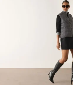 Piumino smanicato reversibile a coste intrecciate in cashmere