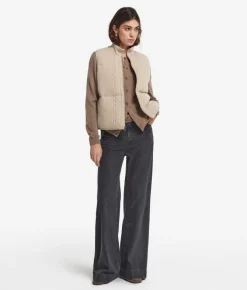 Piumino smanicato reversibile con trecce in cashmere