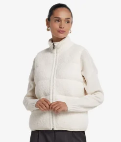 Piumino smanicato reversibile in bouclé