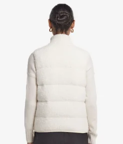 Piumino smanicato reversibile in bouclé