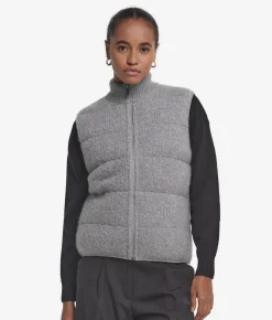 Piumino smanicato reversibile in bouclé