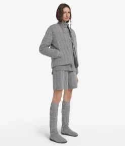 Piumino trecce reversibile in cashmere e tessuto tecnico